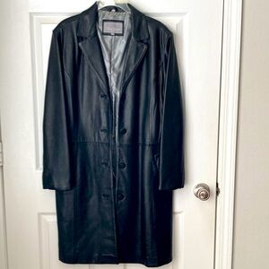 Full length black leather coat in very good condition. Size XL fits like 10/12